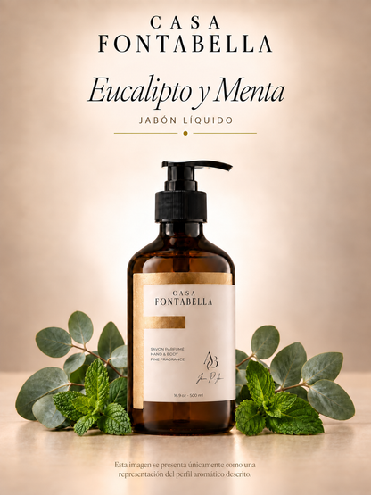 Jabón Eucalipto y Menta de Casa Fontabella, botella ámbar de 500 ml junto a los elementos de su aroma: Eucalipto, menta verde y un toque herbal fresco.