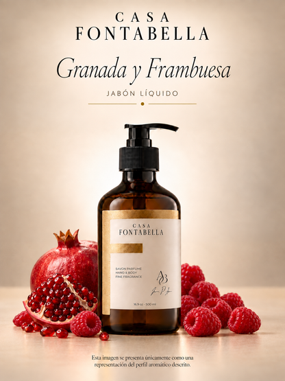 Jabón Granada y Frambuesa de Casa Fontabella, botella ámbar de 500 ml junto a los elementos de su aroma: Granada, frambuesa y un toque de hoja verde.